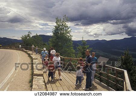 Stock Photo -  Rocky Mountain National Park, CO, Colorado, People at Many Parks Curve overlook off of scenic Trail Ridge Road in Rocky Mountain Nat'l Park.. Fotosearch