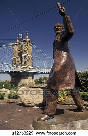 Roebling, Cincinnati, OH, Ohio, Statue of John A. Roebling and a view of the John A. Roebling Suspension Bridge on the Ohio River. View Large Photo Image Stock Photo - Roebling, Cincinnati, OH, Ohio, Statue of John A. Roebling and a view of the John A. Roebling Suspension Bridge on the Ohio River.. Fotosearch
