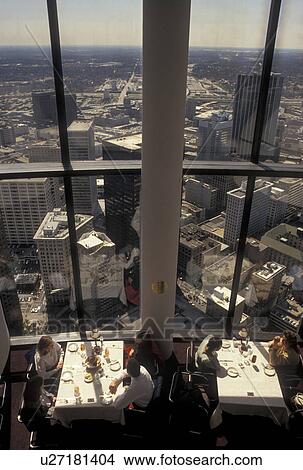 rotating restaurant, aerial view, Atlanta, GA, Georgia, People dining at the top of Westin Peachtree Plaza Hotel Restaurant with a scenic aerial view of downtown Atlanta. View Large Photo Image Picture - rotating restaurant, aerial view, Atlanta, GA, Georgia, People dining at the top of Westin Peachtree Plaza Hotel Restaurant with a scenic aerial view of downtown Atlanta.. Fotosearch