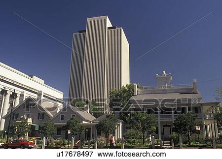 Stock Photo -  Salt Lake City, UT, Brigham Young, mormons, Utah, The Beehive House, the residence of Brigham Young, and The Church of Jesus Christ of Latter-Day Saints Office Building in Salt Lake City. . Fotosearch