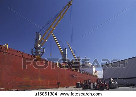 Savannah, GA, Georgia, Loading cargo onto a cargo ship moored at the Dock Yard on the Savannah River in Savannah. View Large Photo Image Picture - Savannah, GA, Georgia, Loading cargo onto a cargo ship moored at the Dock Yard on the Savannah River in Savannah. . Fotosearch