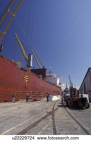 Savannah, GA, Georgia, Loading cargo onto a cargo ship moored at the Dock Yard on the Savannah River in Savannah. View Large Photo Image Picture - Savannah, GA, Georgia, Loading cargo onto a cargo ship moored at the Dock Yard on the Savannah River in Savannah. . Fotosearch