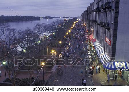 Savannah, GA, Georgia, St. Patrick's Day Celebration in the evening along the Historic River Front in Savannah. View Large Photo Image Stock Photo - Savannah, GA, Georgia, St. Patrick's Day Celebration in the evening along the Historic River Front in Savannah. . Fotosearch