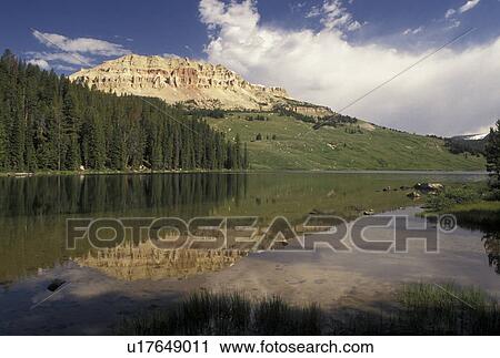 Shoshone National Forest, WY, Wyoming, Reflection of mountain butte in the calm waters of Beartooth Lake in the Shoshone Nat'l Forest in Wyoming. View Large Photo Image Stock Image - Shoshone National Forest, WY, Wyoming, Reflection of mountain butte in the calm waters of Beartooth Lake in the Shoshone Nat'l Forest in Wyoming.. Fotosearch