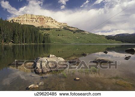 Shoshone National Forest, WY, Wyoming, Reflection of mountain butte in the calm waters of Beartooth Lake in the Shoshone Nat'l Forest in Wyoming. View Large Photo Image Stock Photography - Shoshone National Forest, WY, Wyoming, Reflection of mountain butte in the calm waters of Beartooth Lake in the Shoshone Nat'l Forest in Wyoming.. Fotosearch
