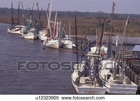 Stock Photography -  shrimp boat, GA, Darien, Georgia, Shrimp boats docked along Altamaha River in Darien.. Fotosearch