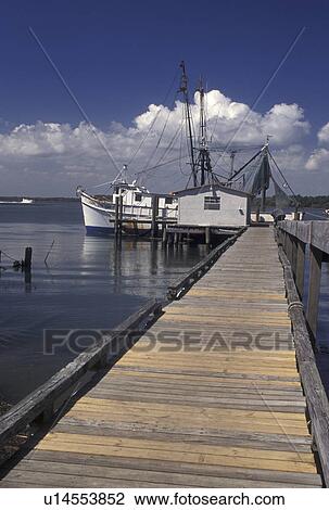 Stock Image -  shrimp boat, Hilton Head Island, SC, South Carolina, Shrimp boat docked along Skull Creek on Hilton Head Island.. Fotosearch
