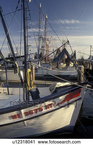 Stock Image -  shrimp boat, Mississippi, MS, Biloxi, Shrimp boats docked in the harbor of the Gulf of Mexico in Biloxi.. Fotosearch