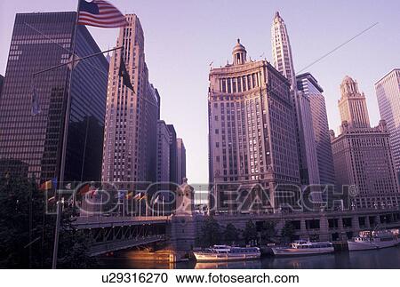 skyline, Chicago, IL, Illinois, Downtown skyline of Chicago along the Chicago River at sunrise. View Large Photo Image Stock Image - skyline, Chicago, IL, Illinois, Downtown skyline of Chicago along the Chicago River at sunrise.. Fotosearch