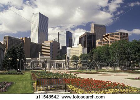 Stock Image -  skyline, Denver, CO, Colorado, Skyline of downtown Denver from Civic Center Park adorned with flowers.. Fotosearch