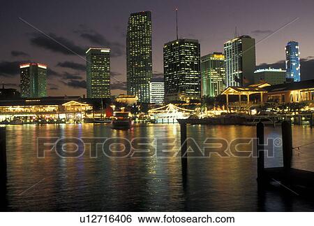 skyline, Miami, FL, Florida, Atlantic Ocean, Skyline of downtown Miami from Bayside on Biscayne Bay in the evening. View Large Photo Image Stock Photograph - skyline, Miami, FL, Florida, Atlantic Ocean, Skyline of downtown Miami from Bayside on Biscayne Bay in the evening.. Fotosearch