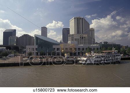 skyline, New Orleans, Louisiana, LA, View of the Aquarium of the Americas and downtown skyline of New Orleans along the Mississippi River. Passenger ferry along the riverfront. View Large Photo Image Stock Image - skyline, New Orleans, Louisiana, LA, View of the Aquarium of the Americas and downtown skyline of New Orleans along the Mississippi River. Passenger ferry along the riverfront.. Fotosearch