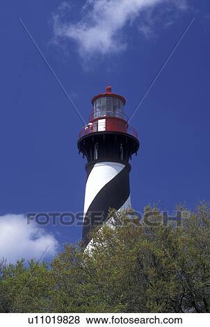 St. Augustine, FL, Florida, St. Augustine Lighthouse against a blue sky on Anastasia Island in Saint Augustine. View Large Photo Image Stock Photo - St. Augustine, FL, Florida, St. Augustine Lighthouse against a blue sky on Anastasia Island in Saint Augustine.. Fotosearch