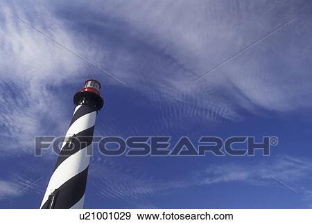 St. Augustine, FL, Florida, St. Augustine Lighthouse against a blue sky on Anastasia Island in Saint Augustine. View Large Photo Image Stock Photo - St. Augustine, FL, Florida, St. Augustine Lighthouse against a blue sky on Anastasia Island in Saint Augustine.. Fotosearch