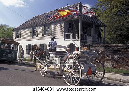 St. Augustine, FL, Florida, Horse-drawn carriage ride passes by the Oldest House (Gonzalez-Alvarez) in the Old City of Saint Augustine. View Large Photo Image Stock Image - St. Augustine, FL, Florida, Horse-drawn carriage ride passes by the Oldest House (Gonzalez-Alvarez) in the Old City of Saint Augustine.. Fotosearch