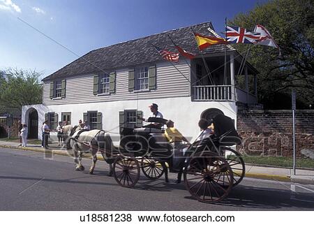 St. Augustine, FL, Florida, Horse-drawn carriage ride passes by the Oldest House (Gonzalez-Alvarez) in the Old City of Saint Augustine. View Large Photo Image Stock Photo - St. Augustine, FL, Florida, Horse-drawn carriage ride passes by the Oldest House (Gonzalez-Alvarez) in the Old City of Saint Augustine.. Fotosearch