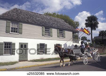 St. Augustine, FL, Florida, Horse-drawn carriage ride passes by the Oldest House (Gonzalez-Alvarez) in the Old City of Saint Augustine. View Large Photo Image Stock Photography - St. Augustine, FL, Florida, Horse-drawn carriage ride passes by the Oldest House (Gonzalez-Alvarez) in the Old City of Saint Augustine.. Fotosearch