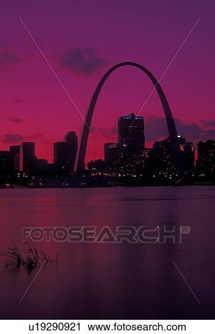 St. Louis, Gateway Arch, MO, Missouri, View of the Gateway Arch and downtown skyline of Saint Louis along the Mississippi River at sunset. View Large Photo Image Stock Image - St. Louis, Gateway Arch, MO, Missouri, View of the Gateway Arch and downtown skyline of Saint Louis along the Mississippi River at sunset. . Fotosearch