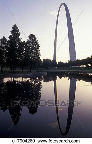 St. Louis, MO, Gateway Arch, Missouri, The Gateway Arch reflects in the pond at sunrise in Saint Louis. Jefferson National Expansion Memorial. Gateway to the West. View Large Photo Image Stock Image - St. Louis, MO, Gateway Arch, Missouri, The Gateway Arch reflects in the pond at sunrise in Saint Louis. Jefferson National Expansion Memorial. Gateway to the West.. Fotosearch