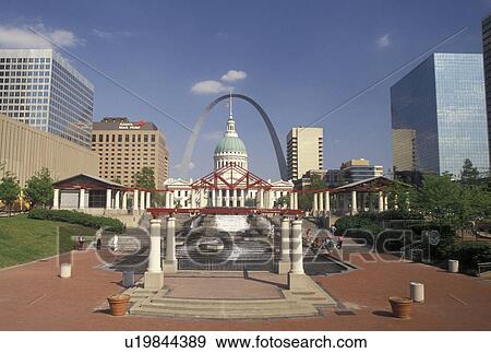 Stock Photo -  St. Louis, MO, Missouri, View of the Gateway Arch and Old Courthouse from Kiener Plaza in downtown Saint Louis. . Fotosearch