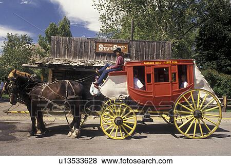 stage coach, Jackson, WY, Wyoming, A stage coach carries tourists through downtown Jackson. View Large Photo Image Stock Photo - stage coach, Jackson, WY, Wyoming, A stage coach carries tourists through downtown Jackson.. Fotosearch
