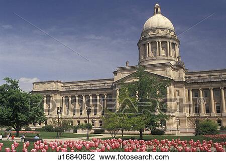 Stock Image -  State Capitol, Frankfort, KY, Kentucky, Pink tulips decorate the grounds of the Kentucky State Capitol Building in the capital city of Frankfort in the spring.. Fotosearch