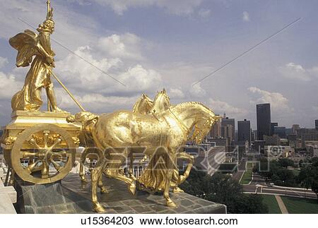 State Capitol, St. Paul, MN, State House, Minnesota, Twin Cities, The Progress of the State gold chariot statue representing prosperity under the dome of the Minnesota State Capitol building in the capital city of Saint Paul. View Large Photo Image Stock Image - State Capitol, St. Paul, MN, State House, Minnesota, Twin Cities, The Progress of the State gold chariot statue representing prosperity under the dome of the Minnesota State Capitol building in the capital city of Saint Paul.. Fotosearch