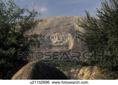 Stock Photograph -  Stone Mountain, GA, Atlanta, Georgia, View of The Confederate Memorial Carving of President Jefferson Davis, General Thomas Stonewall Jackson and General Robert E. Lee on Stone Mountain at Georgia's Stone Mountain Park in Stone Mountain. . Fotosearch