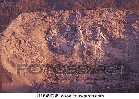 Stone Mountain, GA, Atlanta, Confederate Memorial Carving, Georgia, The Confederate Memorial Carving of President Jefferson Davis, General Thomas Stonewall Jackson and General Robert E. Lee on Stone Mountain at Georgia's Stone Mountain Park in Atlanta. View Large Photo Image Stock Photo - Stone Mountain, GA, Atlanta, Confederate Memorial Carving, Georgia, The Confederate Memorial Carving of President Jefferson Davis, General Thomas Stonewall Jackson and General Robert E. Lee on Stone Mountain at Georgia's Stone Mountain Park in Atlanta. . Fotosearch