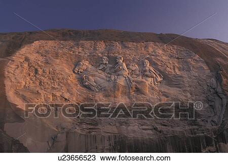Stock Image -  Stone Mountain, GA, Confederate Memorial Carving, Georgia, The Confederate Memorial Carving on Stone Mountain a massive dome of granite rock at Georgia's Stone Mountain Park in Atlanta. . Fotosearch
