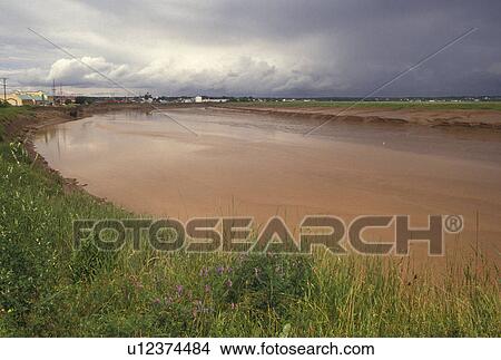 storm clouds, Petitcodiac River, Moncton, New Brunswick, NB, Canada, Storm clouds along the Petitcodiac River in the town of Moncton in New Brunswick. View Large Photo Image Picture - storm clouds, Petitcodiac River, Moncton, New Brunswick, NB, Canada, Storm clouds along the Petitcodiac River in the town of Moncton in New Brunswick.. Fotosearch