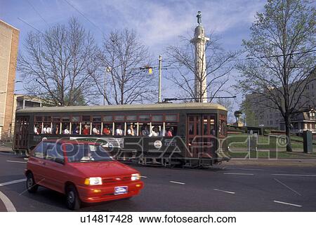 streetcar, New Orleans, LA, Louisiana, St. Charles Avenue Streetcar travels around Lee Circle in New Orleans. View Large Photo Image Stock Photo - streetcar, New Orleans, LA, Louisiana, St. Charles Avenue Streetcar travels around Lee Circle in New Orleans.. Fotosearch