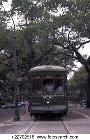 Stock Photo -  streetcar, New Orleans, LA, Louisiana, St. Charles Avenue Streetcar on Saint Charles Street in New Orleans.. Fotosearch