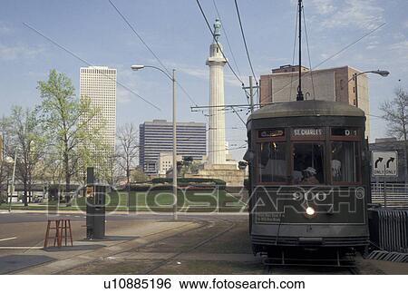 Stock Photograph -  streetcar, New Orleans, Louisiana, trolley, LA, St. Charles Avenue Streetcar at Lee Circle in downtown New Orleans.. Fotosearch