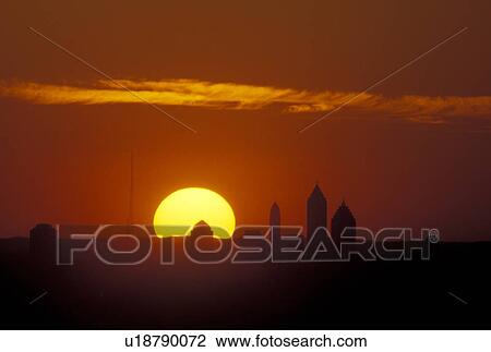 Stock Image -  sun, Atlanta, GA, Georgia, Atlanta skyline at sunset from Stone Mountain.. Fotosearch