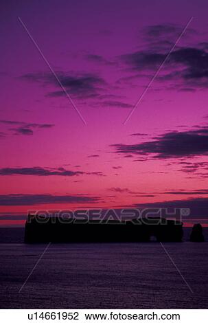 sunrise, Gaspe Peninsula, Perce, Quebec, Canada, Rocher Perce, Gulf of St. Lawrence, Scenic view of sunrise over Rocher Perce (Perce Rock) on the Gulf of St. Lawrence in Perce on Gaspe Peninsula in Quebec. View Large Photo Image Stock Image - sunrise, Gaspe Peninsula, Perce, Quebec, Canada, Rocher Perce, Gulf of St. Lawrence, Scenic view of sunrise over Rocher Perce (Perce Rock) on the Gulf of St. Lawrence in Perce on Gaspe Peninsula in Quebec.. Fotosearch