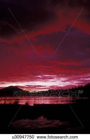 Stock Image -  sunrise, lake, Rocky Mountain National Park, CO, Colorado, Rocky Mts Sunrise on Sprague Lake in Rocky Mountain National Park.. Fotosearch