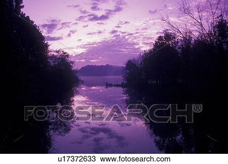Stock Image -  sunrise, lake, VA, NC, Virginia, North Carolina, Scenic view of the sunrise on Lake Gaston in Virginia. Fotosearch