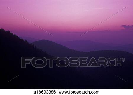 sunrise, mountains, NC, Blue Ridge Parkway, Pisgah National Forest, North Carolina, Scenic view of the mountains at sunrise from the Blue Ridge Pkwy. in North Carolina. View Large Photo Image Stock Photograph - sunrise, mountains, NC, Blue Ridge Parkway, Pisgah National Forest, North Carolina, Scenic view of the mountains at sunrise from the Blue Ridge Pkwy. in North Carolina.. Fotosearch