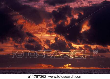 sunrise, sunset, Florida Keys, FL, Florida, Atlantic Ocean, The sun fires up the sky over the Atlantic Ocean View Large Photo Image Stock Image - sunrise, sunset, Florida Keys, FL, Florida, Atlantic Ocean, The sun fires up the sky over the Atlantic Ocean. Fotosearch