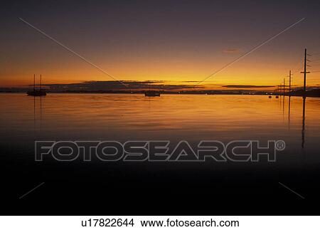 sunset, Florida Keys, FL, Gulf of Mexico, Florida, Atlantic Ocean, Sunset over the Atlantic Ocean View Large Photo Image Picture - sunset, Florida Keys, FL, Gulf of Mexico, Florida, Atlantic Ocean, Sunset over the Atlantic Ocean. Fotosearch