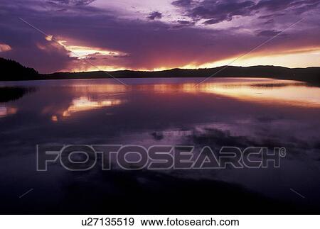 Stock Photo -  sunset, lake, Bighorn National Forest, WY, Wyoming, Sunset over Meadowlark Lake in Bighorn Nat'l Forest in Wyoming.. Fotosearch