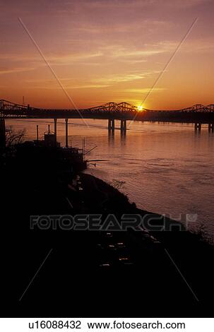 sunset, Mississippi River, Natchez, MS, Mississippi, Scenic view of a bridge spanning the Mississippi River at sunset in Natchez. View Large Photo Image Stock Image - sunset, Mississippi River, Natchez, MS, Mississippi, Scenic view of a bridge spanning the Mississippi River at sunset in Natchez. . Fotosearch