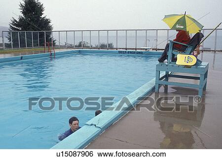 swimming pool, New Brunswick, Fundy National Park, Canada, NB, Children swimming in heated saltwater pool on a rainy day in Fundy National Park in New Brunswick. View Large Photo Image Stock Photograph - swimming pool, New Brunswick, Fundy National Park, Canada, NB, Children swimming in heated saltwater pool on a rainy day in Fundy National Park in New Brunswick.. Fotosearch
