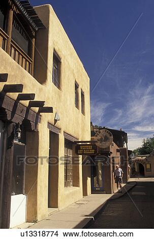Picture -  Taos, NM, New Mexico, Adobe style shops and galleries in downtown Taos.. Fotosearch