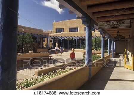 Taos, NM, New Mexico, Shopping plaza, adobe style architecture, in the village of Taos. View Large Photo Image Stock Photo - Taos, NM, New Mexico, Shopping plaza, adobe style architecture, in the village of Taos.. Fotosearch