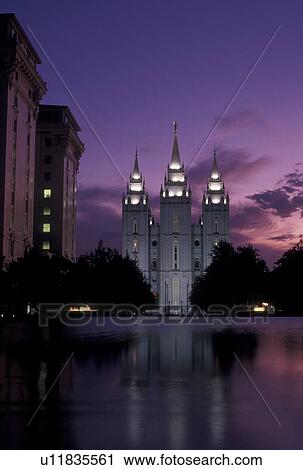 Stock Image -  temple, Salt Lake City, UT, mormons, Utah, Mormon Temple reflects in the pool at Temple Square at sunset in Salt Lake City. The Church of Jesus Christ of Latter-day Saints.. Fotosearch