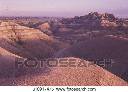 The Badlands, Badlands National Park, SD, South Dakota, Spectacular landscape of rock formations in Badlands Nat'l Park at sunset in South Dakota. View Large Photo Image Stock Photography - The Badlands, Badlands National Park, SD, South Dakota, Spectacular landscape of rock formations in Badlands Nat'l Park at sunset in South Dakota.. Fotosearch