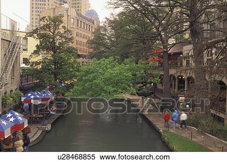The Riverwalk, San Antonio, TX, Texas, Outdoor cafes and restaurants along Paseo Del Rio, The Riverwalk, in downtown San Antonio in the evening.  View Large Photo Image Stock Photography -  The Riverwalk, San Antonio, TX, Texas, Outdoor cafes and restaurants along Paseo Del Rio, The Riverwalk, in downtown San Antonio in the evening. . Fotosearch