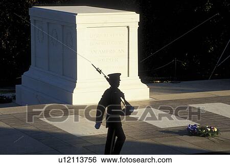 Stock Photograph -  Tomb of the Unknown Soldier, Arlington National Cemetery, VA, Arlington, Virginia, An Honor Guard marches in front of the Tomb of the Unknown Soldier at the Arlington Nat'l Cemetery.. Fotosearch